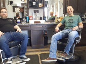 Cedric Small (left), host of The Global Barber, is shown with Gregory Dennis, master barber at Black Comb Barbershop in Blenheim, on Oct. 19. The show's film crew was shooting in the community, as well as making other stops throughout the area. Trevor Terfloth/Postmedia