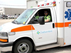 Medavie paramedics Mark Martin, in the driver's seat, and Steve Forbes are shown outside of Chatham-Kent EMS headquarters in this file photo from 2017. File photo/Postmedia Network
