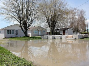 Water levels on lakes Erie and St. Clair are down from the peaks of the past couple of years but still remain high, Lower Thames Valley Conservation Authority officials warn. "Given that the significant flooding issues on Lake Erie and Lake St. Clair began around 2017, flooding remains a concern," the conservation authority stated. Shown is Erie Shore Drive in Chatham-Kent in 2017. File photo/Postmedia Network