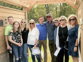 Pictured above is the Winters family at the newly-created Commemorative Woods at Klondyke Park in Grand Bend. A sign in the arbour reads 'Winters Walk' in memory of Hank Winters. Handout