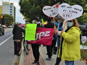 About 40 protesters came together on Monday in front of MPP Jim McDonell's office in order to demand change in the long-term care sector Photo taken on Monday October 4, 2021 in Cornwall, Ont. Francis Racine/Cornwall Standard-Freeholder/Postmedia Network