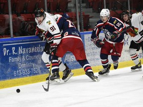 Brockville's Colin Elliott (91) tries to get away from Colts players including Simon Laferriere (15) during Thursday's game at the civic complex.Photo on Thursday, October 7, 2021, in Cornwall, Ont. Robert Lefebvre/Special to the Cornwall Standard-Freeholder/Postmedia Network