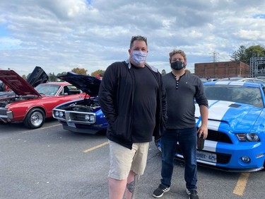From left, Nick MacNaughton and Thomas Sylvester were happy to see hundreds attend the third Cars and Coffee Cornwall event on Saturday October 9, 2021 in Cornwall, Ont. Shawna O'Neill/Cornwall Standard-Freeholder/Postmedia Network