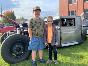 Brothers Wyatt and Flynn Galna looking at some dream cars during Cars and Coffee Cornwall on Saturday October 9, 2021 in Cornwall, Ont. Shawna O'Neill/Cornwall Standard-Freeholder/Postmedia Network