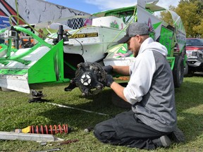 Tyler Givogue was working on a car before it hit the track during the Fall Showdown at Cornwall Motor Speedway on Sunday October 10, 2021 in Cornwall, Ont. Shawna O'Neill/Cornwall Standard-Freeholder/Postmedia Network