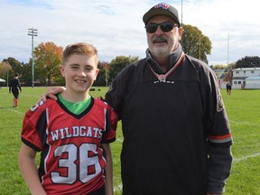 Colin Markell and his grandfather Gerry Jean enjoying the weather and the action at Joe St. Denis Field on Sunday October 10, 2021 in Cornwall, Ont. Shawna O'Neill/Cornwall Standard-Freeholder/Postmedia Network