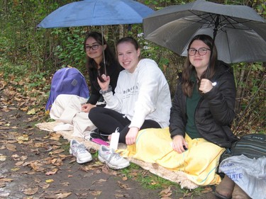 Holy Trinity students serving as volunteer course monitors at the meet included (from left) Audrey Van den Oetelaar, Ciana Bradford and Mason Luchuk-Willis. Photo on Wednesday, October 13, 2021, in Cornwall, Ont. Todd Hambleton/Cornwall Standard-Freeholder/Postmedia Network