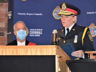 From left, Judge Gilles Renaud swearing in Police Chief Shawna Spowart during the Change of Command ceremony on Friday October 22, 2021 in Cornwall, Ont. Shawna O'Neill/Cornwall Standard-Freeholder/Postmedia Network