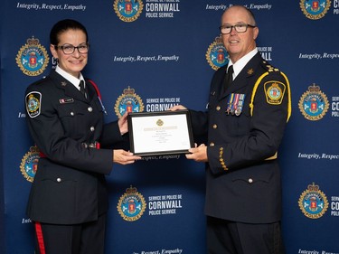 Cst. Sherri Cameron receiving her 25-Year CPS Long Service Award from Chief Danny Aikman during the 26th annual CPS and CPA Retirement Recognition Evening. Handout/Cornwall Standard-Freeholder/Postmedia Network