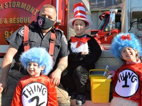 Back row, from left: Rodney Beaudette with South Stormont fire and RJ Rupp. Front row: William Rupp and Cindy Rupp. All smiles at the It's the Great Pumpkin Newington event on Sunday October 24, 2021 in Newington, Ont. Shawna O'Neill/Cornwall Standard-Freeholder/Postmedia Network