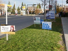 Signs for town council candidates in downtown Cochrane on October 5. Patrick Gibson/Cochrane Times