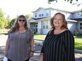 Maggie McLaren, executive director of Dawn House, left, and former client Lisa Larose at the facility in Kingston on Friday.