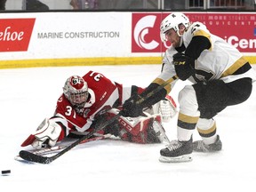 Kingston Frontenacs forward Shane Wright can't get the puck past Ottawa 67's goaltender Will Cranley in Ontario Hockey League action at the Leon's Centre in Kingston on Friday night.