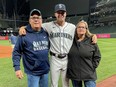 Kingston's Matt Brash of the Seattle Mariners with his parents, Jamie and Sandra, at T-Mobile Park in Seattle on Tuesday, Sept. 28, 2021, after Brash was called up to the major-league club prior to its game against the Oakland Athletics.