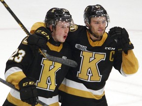 Kingston Frontenacs' Ethan Ritchie, left, celebrates his goal with teammate Shane Wright during third-period Ontario Hockey League action on Saturday, Oct. 16, 2021, in Peterborough. Kingston beat the Petes, 3-1. CLIFFORD SKARSTEDT/Peterborough Examiner