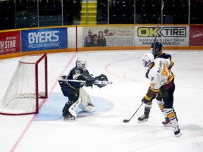 KL Gold Miners' goalie Nick Alvarez takes this shot in the chest during Friday's loss to Timmins.