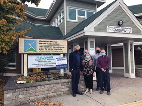 Charlie Angus, Member of Parliament, Lesley Edwards, NP with CMHA-CT, Mike Cole, CMHA-CT Program Manager, John Vanthof, Member of the  Ontario Provincial Parliament, and Tyler Twarowski, CMHA-CT Director of Service, pictured here at the CMHA-CT New Liskeard site.