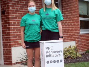 With a grant from the Sunset Community Foundation, the Eco Exeter group at South Huron District High School is buying another 41 PPE recycling boxes, which prevents items such as face masks and gloves from ending up in landfills. Pictured are Grade 12 students and Eco Exeter executive members Kayla Orr, left, and Kayleigh Hern.