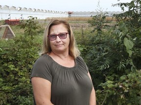 Brenda Alves is shown at her Kingsville home on Thursday, October 14, 2021 which is close to existing greenhouses and the construction of new units.