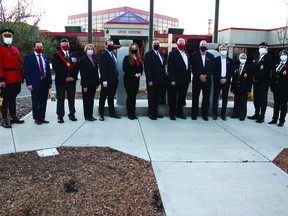 Leduc council members joined Leduc Legion and police officials for the first poppy presentation on Oct. 25 at the cenotaph in front of the Leduc Civic Centre. (Ted Murphy)