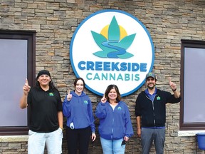 Photo by KEVIN McSHEFFREY/THE STANDARD
Four staff members at Creekside Cannabis on Mississauga First Nation were out on Sept 25 celebrating one year in business.  They are: Tony Chiblow, Julia Horton, Tanya Bennett and Paul Corbiere. They feel they are number one.