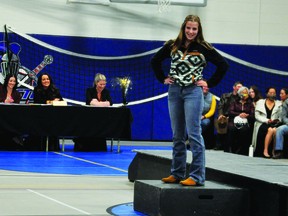 J.T. Foster student Sydney Janzen poses during the Queen's Ball fashion show, held Oct. 19 in J.T. Foster's gym. After being cancelled in 2020 due to COVID-19, the Queen's Ball is scheduled to go ahead this year, on Dec. 3.