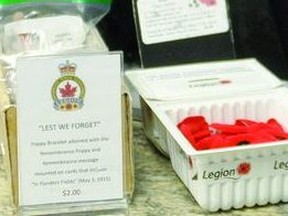 The Nanton Legion's Marylou Slumskie dropped off poppies, as well as poppy bracelets and lapel pins, at A.B. Daley Community School, on Friday, when the Legion's poppy campaign began. Slumskie also made stops at J.T. Foster High School and numerous Nanton businesses Friday morning. STEPHEN TIPPER