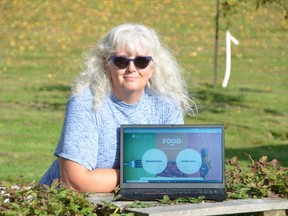 Francesca Dobbyn, executive director of the United Way of Bruce Grey, with the Food Bruce Grey Data Collection Hub app at St. George's Park in Owen Sound on Thursday, October 7, 2021.
(Rob Gowan/The Sun Times)