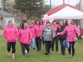 Participants in the first Walk For Her in support of cancer care services at the Pembroke Regional Hospital share a laugh as they begin to walk laps of the Stafford ball diamond during the fundraiser that was held on Saturday, Oct. 16. Organizers were thrilled to more than meet their goal of $10,000 raised as more than $12,300 had been tallied by Monday, Oct. 18.