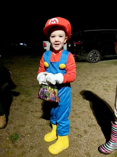 Spencer Litschgy, also known as Super Mario, won third place in the kids' costume contest at the Spooky Movie Night at the Skylight Drive-in.