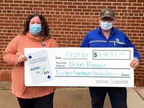 Leigh Costello, community fundraising specialist for the PRH Foundation, presents a cheque for $1,934 to Brian Ranger, the week 13 winner of the of the Pembroke Regional Hospital Foundation's Catch the Ace progressive lottery.