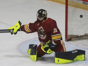 Caledon Bombers goalie James Norton watches Zac McCann's shot get past him during the first period of Friday's game at Allman Arena. Stratford won 9-1.