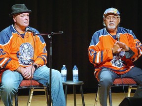 Hockey legend Reggie Leach (right) and his son Jamie Leach address the audience at the recent Truth and Reconciliation event in Dryden. SPECIAL TO SAULT THIS WEEK