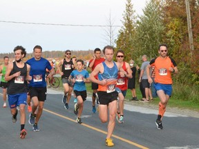 The first wave of runners take off at the Shore to Shore race from Oliphant to Wiarton on Monday, October 11, 2021.