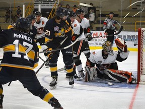 Everyone kept their eyes on the puck as Spruce Grove Saints forward Breck McKinley shot one past the Bobcats goaltender, during game one, Sept. 22, of a three game tilt against Lloydminster last weekend. The Saints won two of the three games, 9-2 and 7-1, and lost game two 6-5 in a shootout.