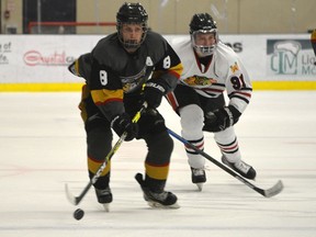 Spruce Grove Regals leading scorer, AJ Kupsch, carries the puck up the ice during a game against the Beverly Warriors at the Grant Fuhr Arena on Oct.15. Kristine Jean.