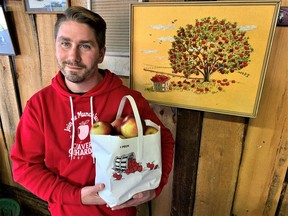 Casey Cleaver of Cleaver Orchards has a wide variety of apples on tap at the family's roadside market on Blue Line Road east of Simcoe.