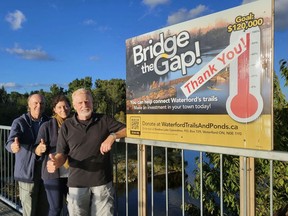 A new bridge will be put in place along the Waterford trail this week. The Bridge the Gap fundraiser for the Waterford Heritage Trail Association surpassed its $120,000 fundraising goal. for the project. More than 100 donations raised $124,000 for the installation of an east bridge along the trail.  Celebrating the accomplishment were, from left, Frank Woodcock, association secretary, Katherine McCurdy-Lapierre, secretary of the Shadow Lake committee, and Andrew Kooistra, chair of the Shadow Lake committee.  CONTRIBUTED PHOTO