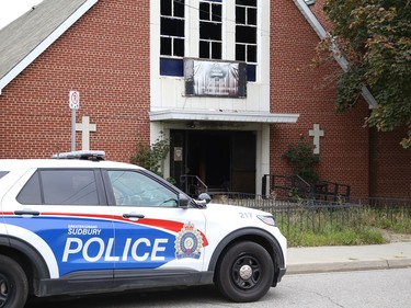 Firefighters and police were on the scene of a fire at the former Theatre Cambrian location on Eyre Street in Sudbury, Ont. on Friday October 1, 2021. John Lappa/Sudbury Star/Postmedia Network