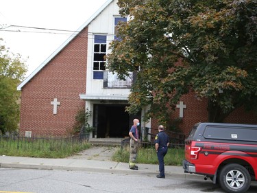 Firefighters and police were on the scene of a fire at the former Theatre Cambrian location on Eyre Street in Sudbury, Ont. on Friday October 1, 2021. John Lappa/Sudbury Star/Postmedia Network