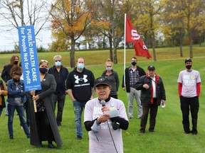 Dot Klein, co-chair of the Sudbury chapter of the Ontario Health Coalition, makes a point at a rally in Sudbury, Ont. on Monday October 4, 2021. John Lappa/Sudbury Star/Postmedia Network