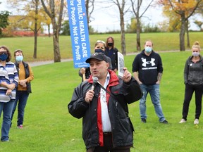Alessandro Presenza, of Hands of Hope, makes a point at a rally organized by the Sudbury chapter of the Ontario Health Coalition on Monday.