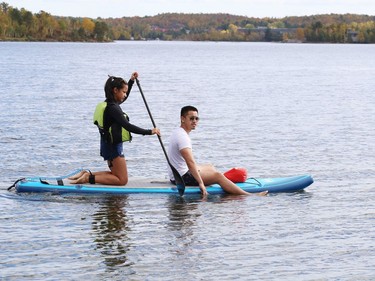 The warm, sunny conditions on Tuesday were ideal for a fall paddle. This pair was out paddleboarding on Ramsey Lake.