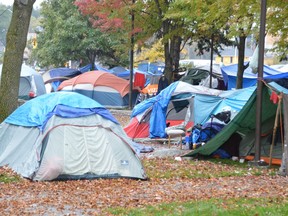 Tents huddle in Memorial Park in October. The homeless encampment has grown bigger in recent weeks.