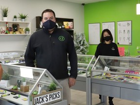 Co-owners John Shelegey, left, and Steve Beaudry pose for a picture with staff Soo Han and Amanda Jeanveau at Cannabis Jacks in Val Caron, Ont. John Lappa/Sudbury Star/Postmedia Network