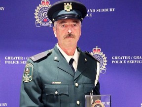Conservation Officer Mitch Turcott of the Ministry of Natural Resources and Forestry receives the Chief's Honorary Distinction Award. Supplied