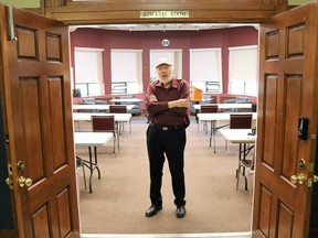 Harmony for Youth board member/choir leader Paul Woolley stands with baton in hand in the Kiwanis Room at the Lochiel Kiwanis Community Centre. Harmony For Youth is offering a free weekly choir program for community youth aged 12 to 18 beginning in October. Carl Hnatyshyn/Sarnia This Week