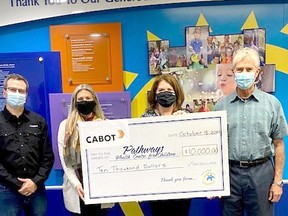 Members from Sarnia's Cabot facility present a cheque for $10,000 to support Pathways Health Centre for Children's First Nations Therapy Program. From left to right: Cabot Canada facility general manager Braam Pretorius, Cabot Canada human resources manager Stephanie Kirkwood, Pathways Health Centre for Children executive director Alison Morrison and Pathways community and corporate partnerships liaison Tim Bechard. Handout/Sarnia This Week