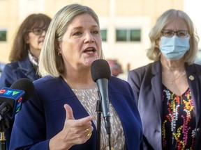 Ontario official opposition NDP leader Andrea Horwath spoke about the need for more health care workers outside St. Joseph's hospital surrounded by local MPP's Terence Kernaghan(out of frame) Teresa Armstrong and Peggy Sattler in London on Oct. 20. Mike Hensen/Postmedia