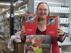 Peggy Bendell, Porcupine-Timmins area coordinator for Operation Christmas Child, says there are six business locations where people can pick up one of these shoe boxes to fill with toys, school supplies and other items including Porcupine Timber Mart in South Porcupine.

RON GRECH/The Daily Press